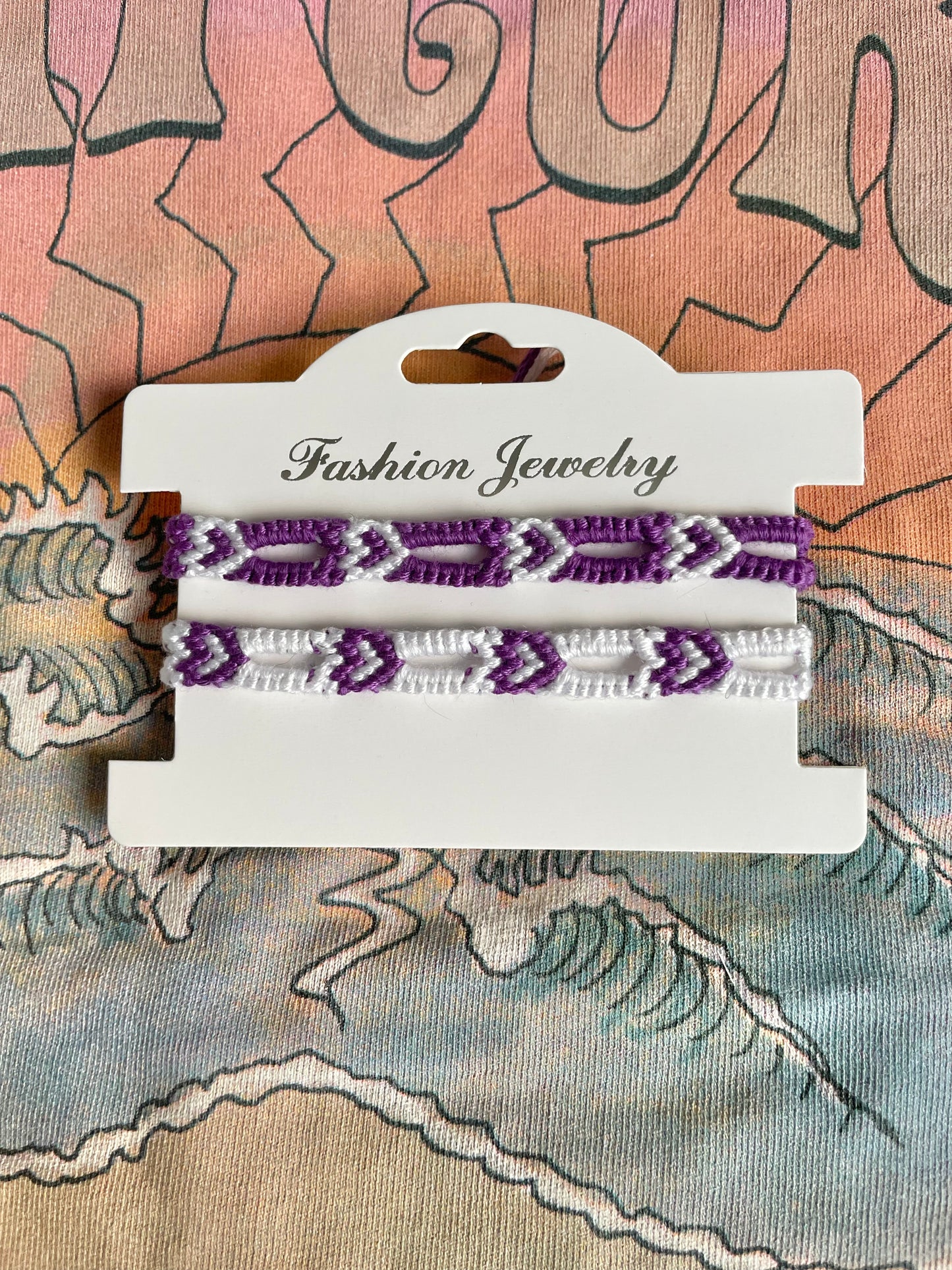 Duo coeurs ajourés violets et blancs